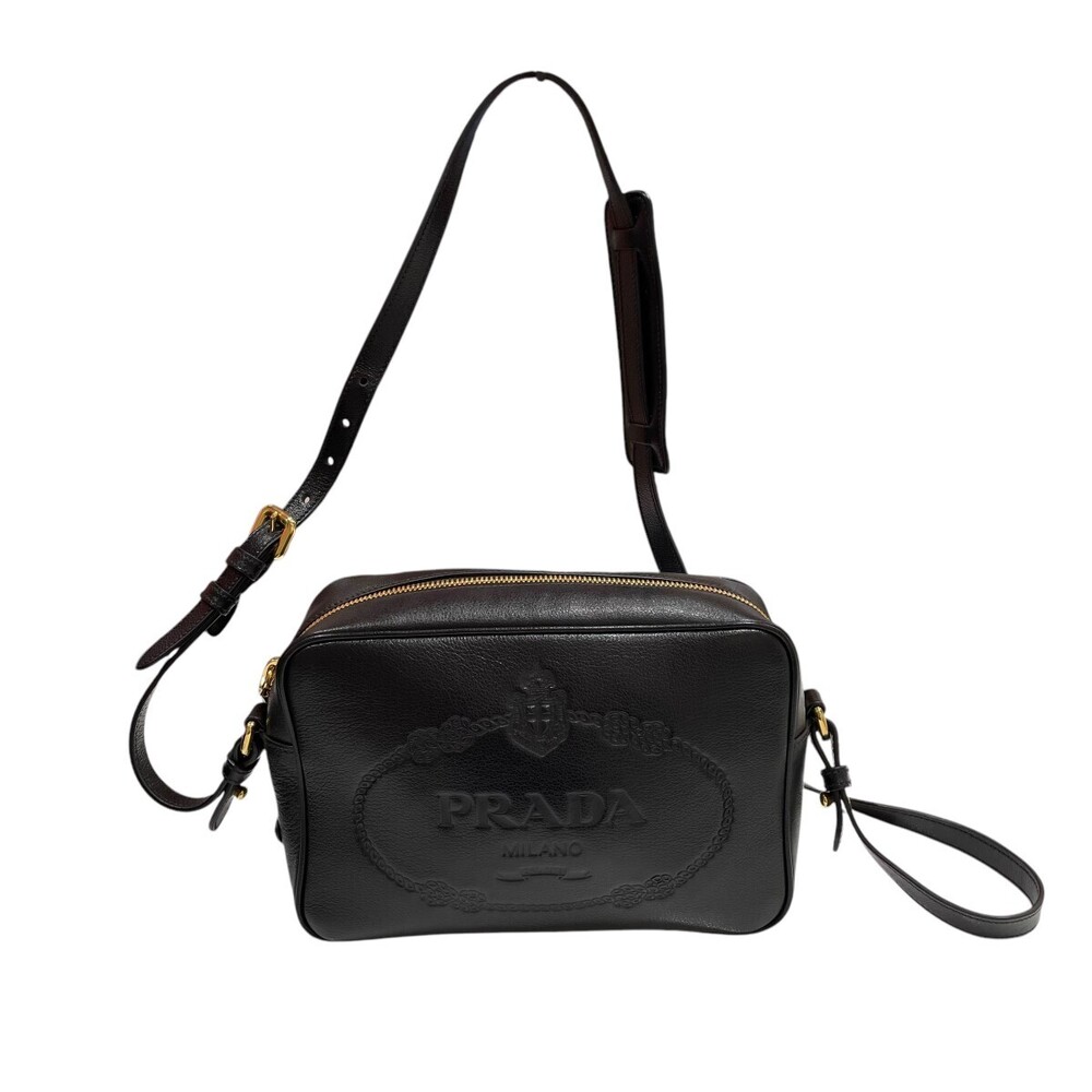 Prada Logo Embossed Leather Camera Bag black leather